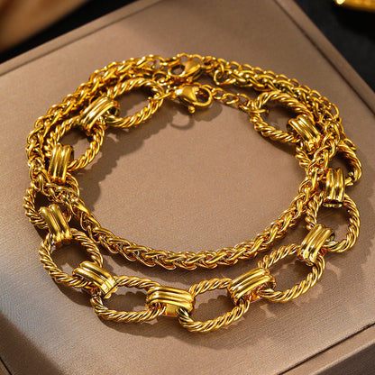 Gold Twisted Link Statement Bracelet