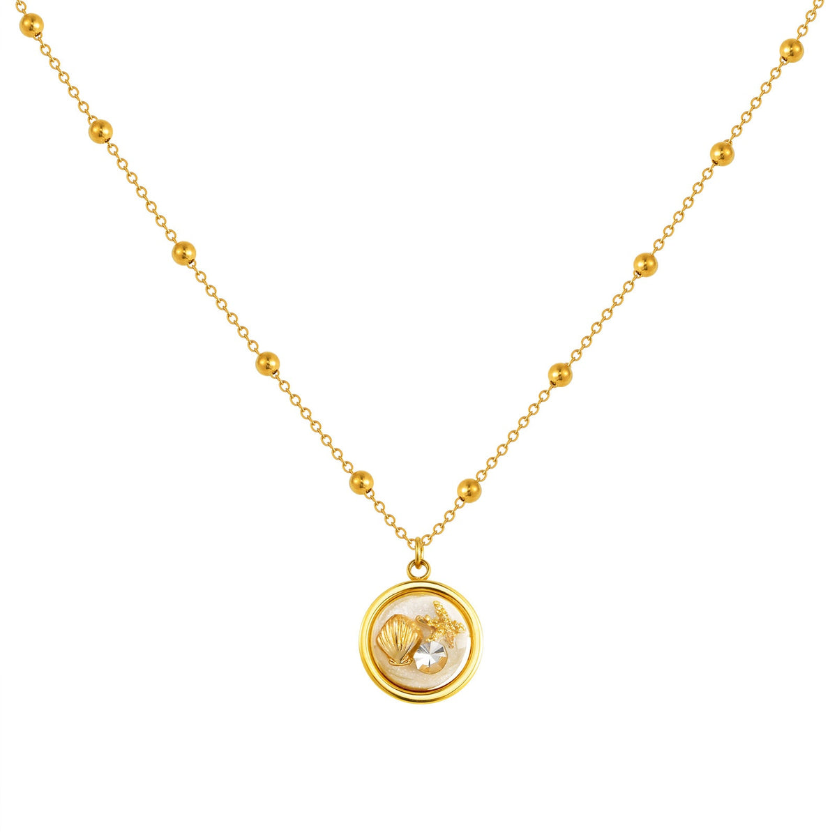 Gold Shell Charm Necklace with Crystal Pendant