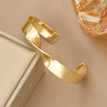 Twist Design Gold Cuff Bracelet