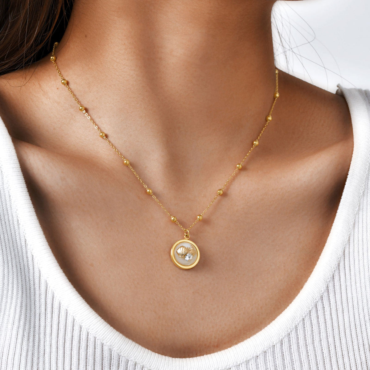 Gold Shell Charm Necklace with Crystal Pendant