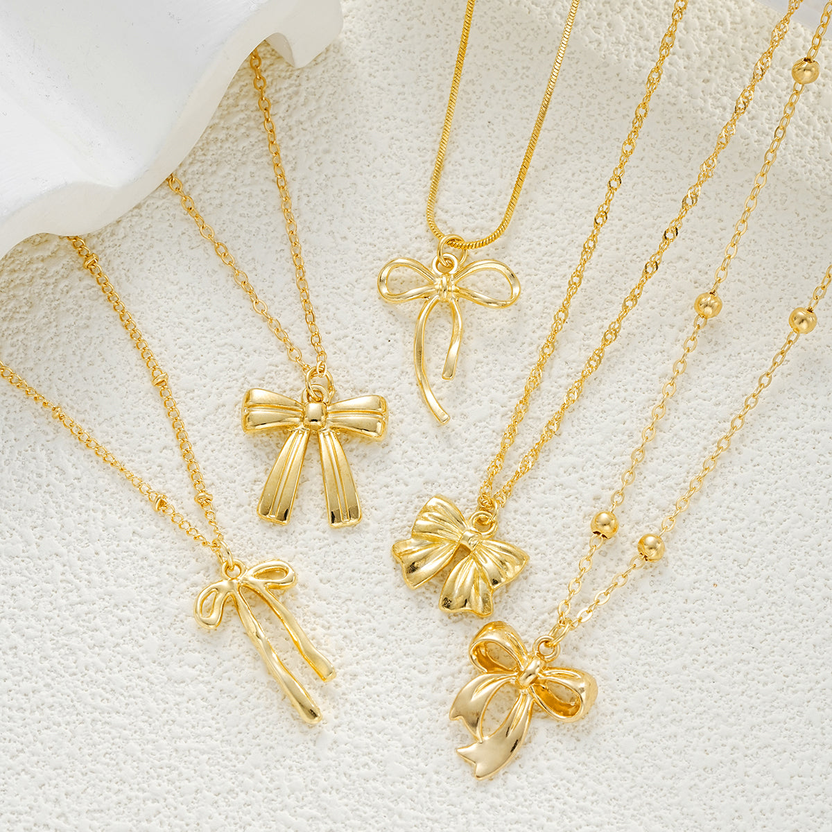 5pc Layered Bow Charm Necklace Set